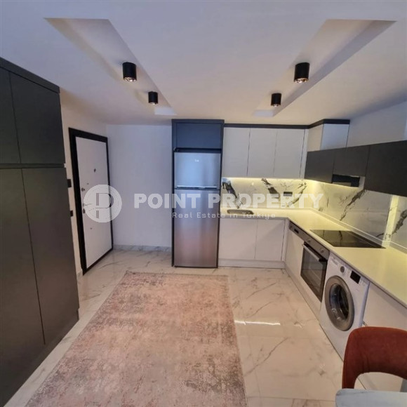 New, ready to move in, one bedroom apartment, 60m², in the center of Alanya-id-2009-photo-3