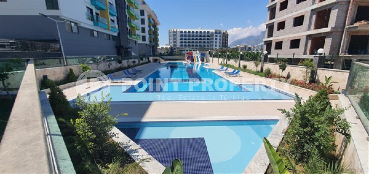 Стильная квартира 1+1, 50м², в новом комплексе премиум класса с собственным пляжем в Каргыджаке, Алания-id-2010-фото-20