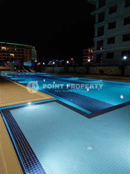 Стильная квартира 1+1, 50м², в новом комплексе премиум класса с собственным пляжем в Каргыджаке, Алания-id-2010-фото-22