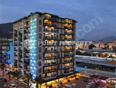One bedroom apartment, 50m², with furniture and household appliances in an elite residence in the center of Alanya-id-2011-photo-1