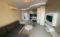 One bedroom apartment, 50m², with furniture and household appliances in an elite residence in the center of Alanya-id-2011-photo-2