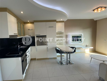 One bedroom apartment, 50m², with furniture and household appliances in an elite residence in the center of Alanya-id-2011-photo-3