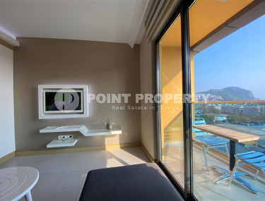 One bedroom apartment, 50m², with furniture and household appliances in an elite residence in the center of Alanya-id-2011-photo-5