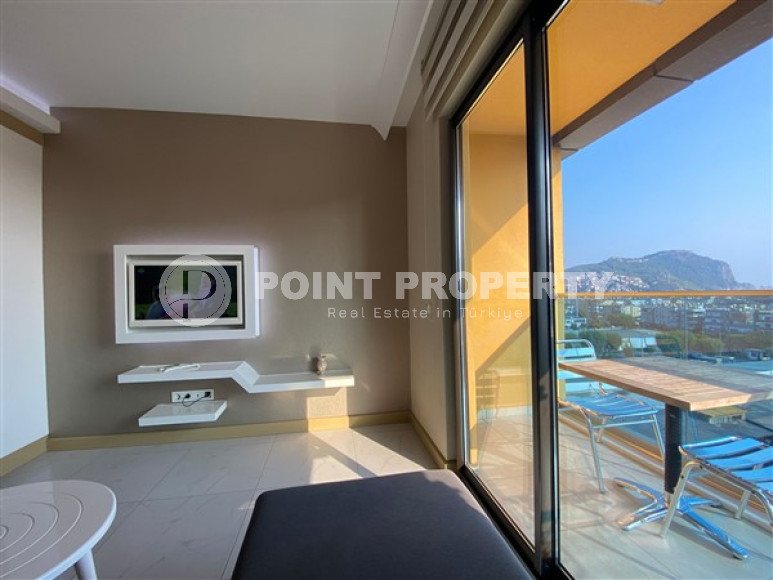 One bedroom apartment, 50m², with furniture and household appliances in an elite residence in the center of Alanya-id-2011-photo-5
