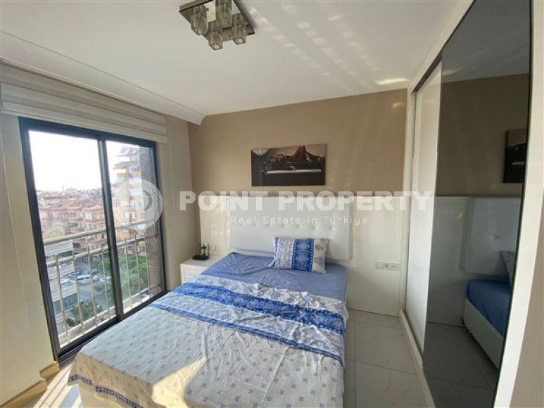 One bedroom apartment, 50m², with furniture and household appliances in an elite residence in the center of Alanya-id-2011-photo-7