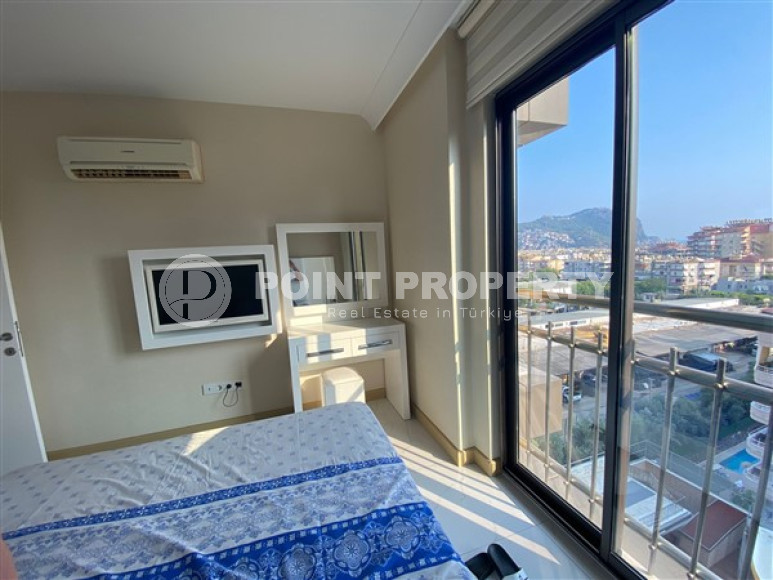 One bedroom apartment, 50m², with furniture and household appliances in an elite residence in the center of Alanya-id-2011-photo-8