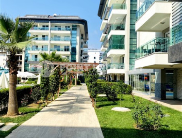 Просторная двухкомнатная квартира, 60м², в уютном комплексе в Кестеле, Алания, в 50м от моря-id-2014-фото-2