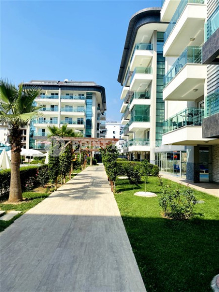 Просторная двухкомнатная квартира, 60м², в уютном комплексе в Кестеле, Алания, в 50м от моря-id-2014-фото-2