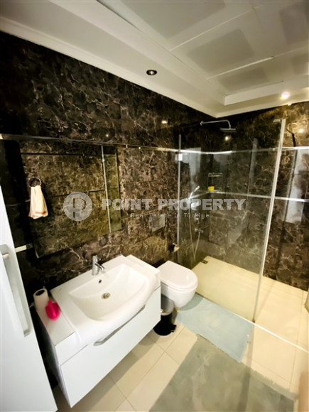 Просторная двухкомнатная квартира, 60м², в уютном комплексе в Кестеле, Алания, в 50м от моря-id-2014-фото-8