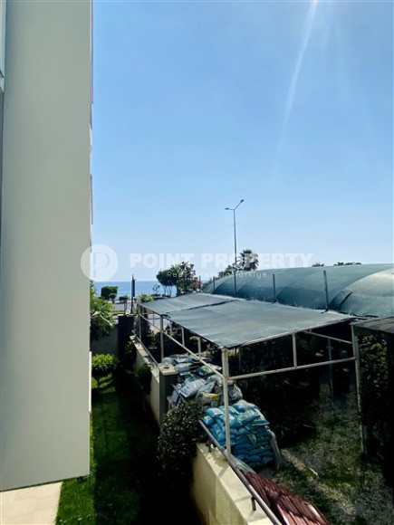 Просторная двухкомнатная квартира, 60м², в уютном комплексе в Кестеле, Алания, в 50м от моря-id-2014-фото-9