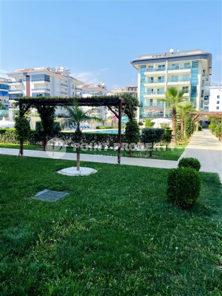 Просторная двухкомнатная квартира, 60м², в уютном комплексе в Кестеле, Алания, в 50м от моря-id-2014-фото-11