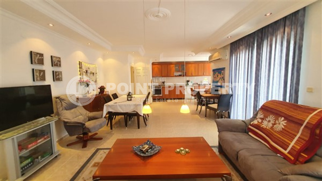 Квартира с двумя спальнями, 110м², с видом на море и горы на центральной улице в районе Алании Тосмур-id-2019-фото-2