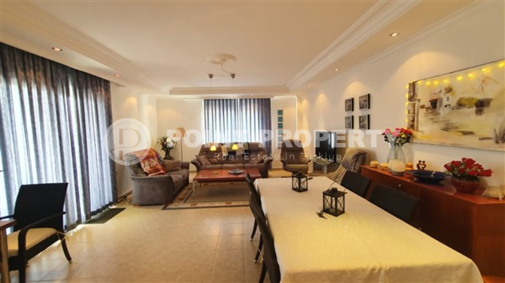 Квартира с двумя спальнями, 110м², с видом на море и горы на центральной улице в районе Алании Тосмур-id-2019-фото-5