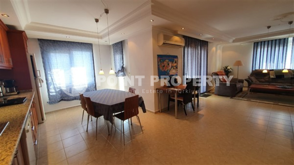 Квартира с двумя спальнями, 110м², с видом на море и горы на центральной улице в районе Алании Тосмур-id-2019-фото-7