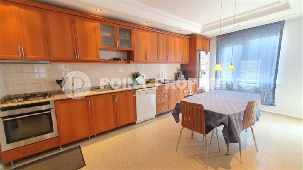 Квартира с двумя спальнями, 110м², с видом на море и горы на центральной улице в районе Алании Тосмур-id-2019-фото-8