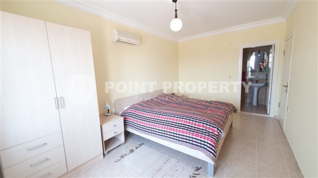 Квартира с двумя спальнями, 110м², с видом на море и горы на центральной улице в районе Алании Тосмур-id-2019-фото-13