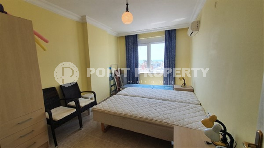 Квартира с двумя спальнями, 110м², с видом на море и горы на центральной улице в районе Алании Тосмур-id-2019-фото-17