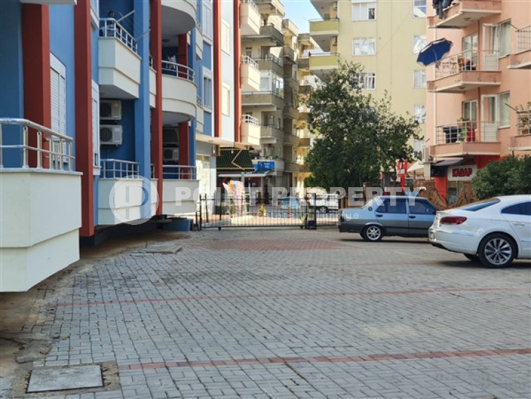 Квартира с двумя спальнями, 110м², с видом на море и горы на центральной улице в районе Алании Тосмур-id-2019-фото-23