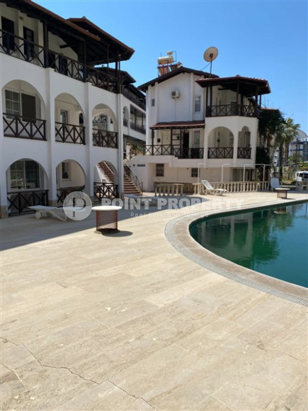 Садовый дуплекс 3+1, 130м², в уютном комплексе, в 250м от моря в районе Тосмур, Алания-id-2027-фото-2