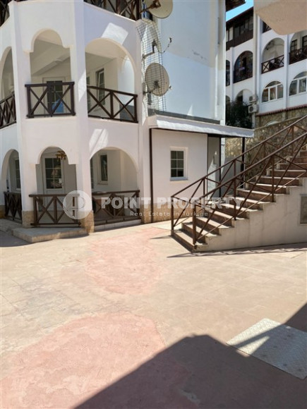 Садовый дуплекс 3+1, 130м², в уютном комплексе, в 250м от моря в районе Тосмур, Алания-id-2027-фото-3