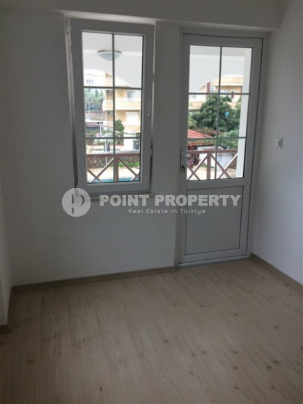 Садовый дуплекс 3+1, 130м², в уютном комплексе, в 250м от моря в районе Тосмур, Алания-id-2027-фото-8