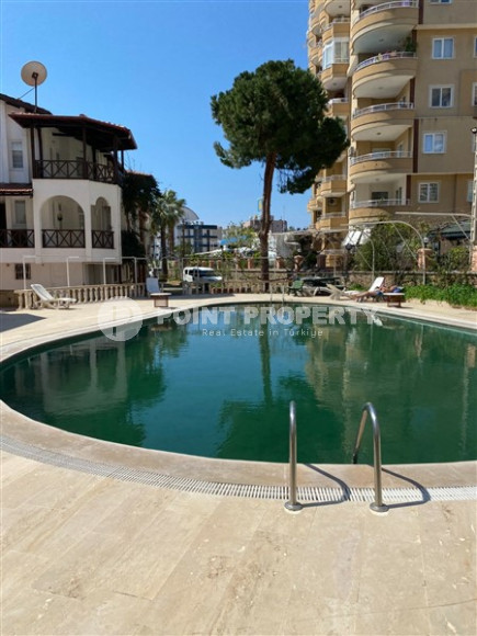 Садовый дуплекс 3+1, 130м², в уютном комплексе, в 250м от моря в районе Тосмур, Алания-id-2027-фото-11