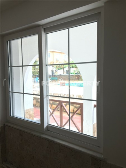 Садовый дуплекс 3+1, 130м², в уютном комплексе, в 250м от моря в районе Тосмур, Алания-id-2027-фото-14