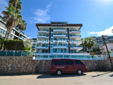 Элегантные трехкомнатные апартаменты, 110м², на первой береговой линии в Каргыджаке, Алания-id-2031-фото-2