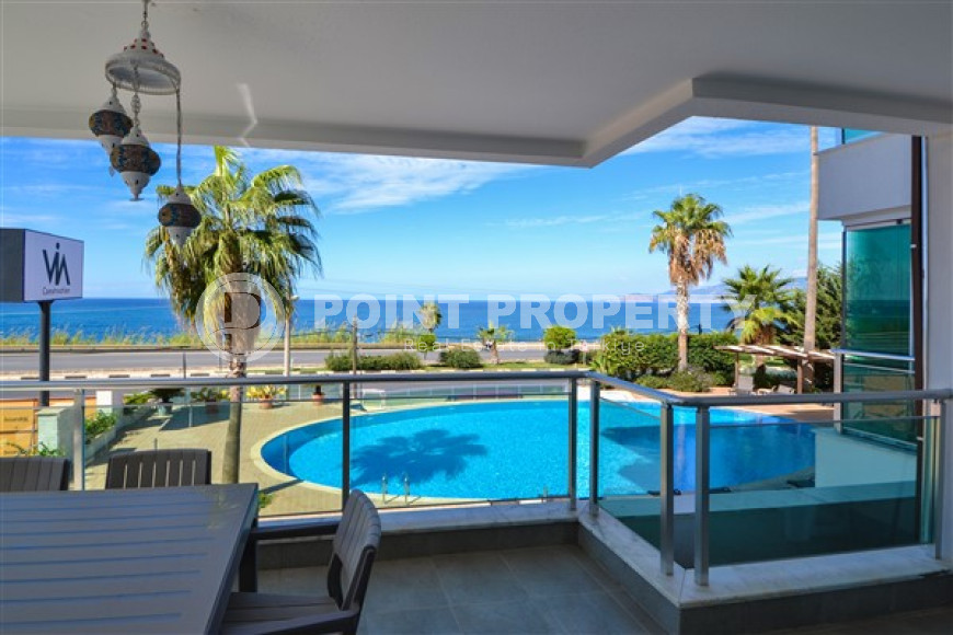 Элегантные трехкомнатные апартаменты, 110м², на первой береговой линии в Каргыджаке, Алания-id-2031-фото-7