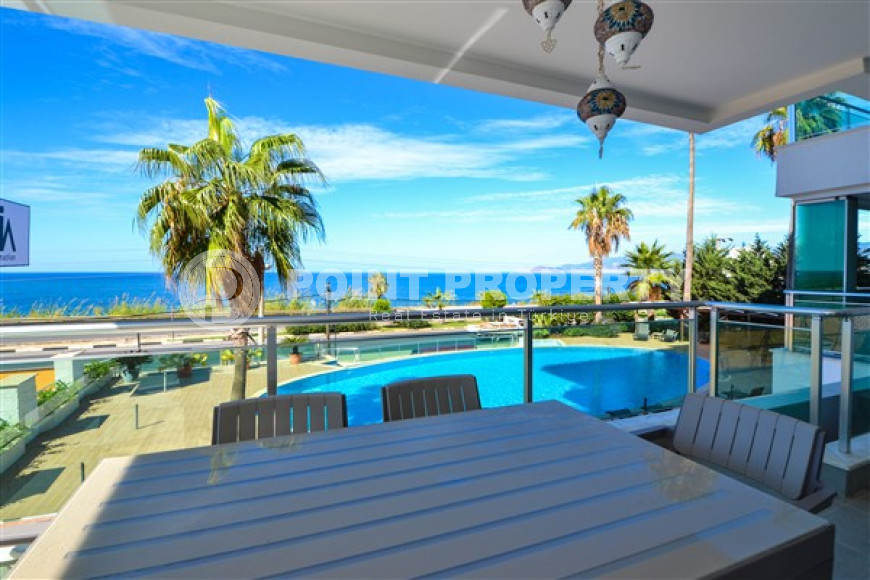 Элегантные трехкомнатные апартаменты, 110м², на первой береговой линии в Каргыджаке, Алания-id-2031-фото-8