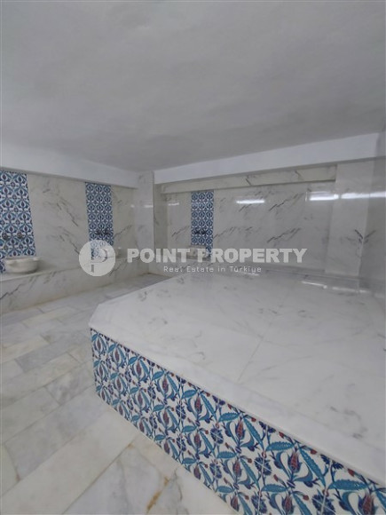 Квартира с двумя спальнями, 77м², в комплексе с инфраструктурой в 300м от пляжа Клеопатры, Алания-id-2038-фото-11