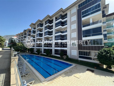 Первая береговая линия: меблированная двухкомнатная квартира, площадью 62м² в Кестеле, Алания-id-2046-фото-1