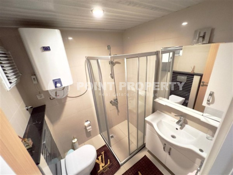 First coastline: furnished one-bedroom apartment of 62m² in Kestel, Alanya-id-2046-photo-10