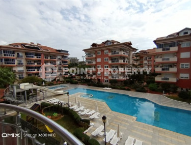 Three-room apartment, 120m², in a residence with good infrastructure in Oba, Alanya-id-2049-photo-1