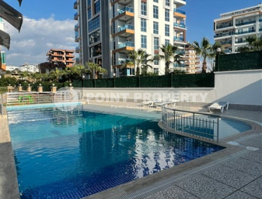 Двухкомнатные апартаменты,70 м2, всего в 200 метрах от моря в районе Тосмур.-id-2075-фото-1