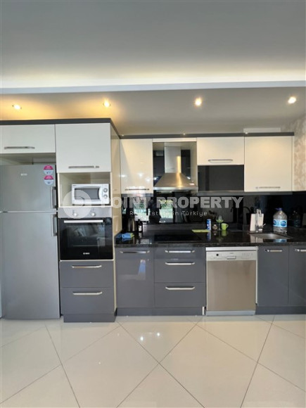 Двухкомнатные апартаменты,70 м2, всего в 200 метрах от моря в районе Тосмур.-id-2075-фото-4