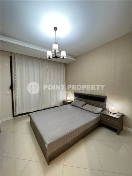 Двухкомнатные апартаменты,70 м2, всего в 200 метрах от моря в районе Тосмур.-id-2075-фото-8