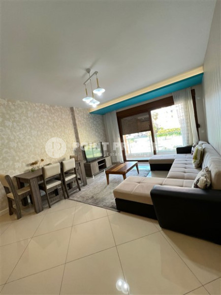 Двухкомнатные апартаменты,70 м2, всего в 200 метрах от моря в районе Тосмур.-id-2075-фото-9