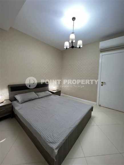 Двухкомнатные апартаменты,70 м2, всего в 200 метрах от моря в районе Тосмур.-id-2075-фото-11