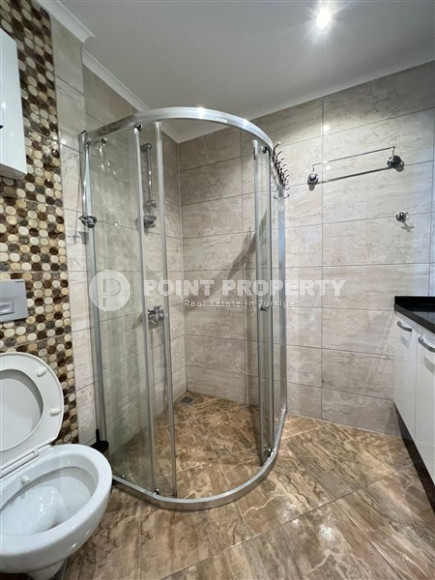 Двухкомнатные апартаменты,70 м2, всего в 200 метрах от моря в районе Тосмур.-id-2075-фото-12