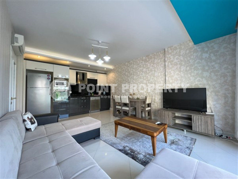 Двухкомнатные апартаменты,70 м2, всего в 200 метрах от моря в районе Тосмур.-id-2075-фото-14