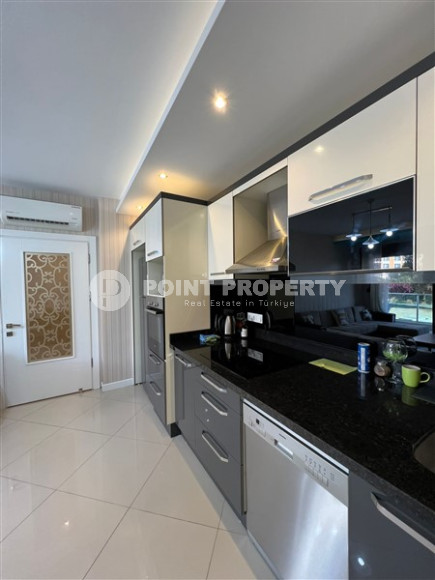 Двухкомнатные апартаменты,70 м2, всего в 200 метрах от моря в районе Тосмур.-id-2075-фото-16