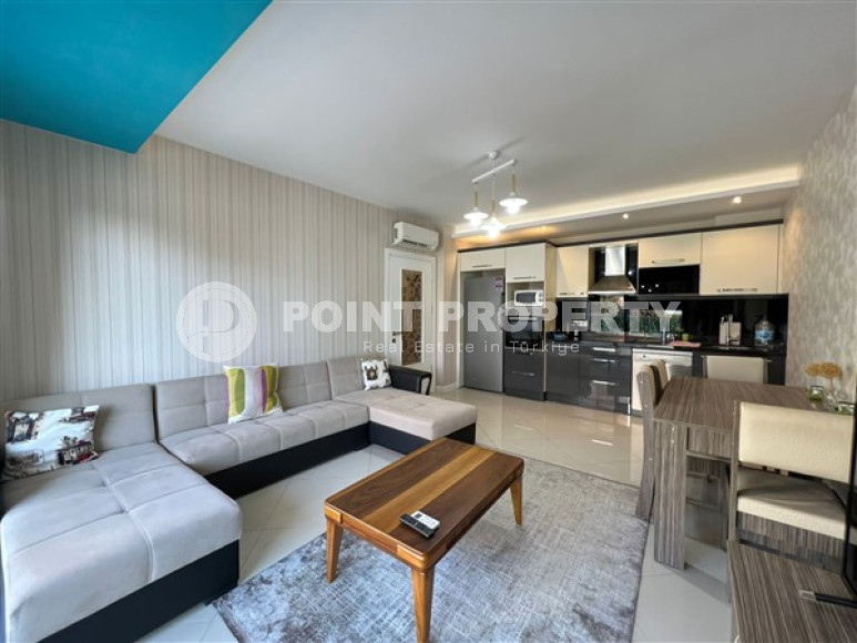 Двухкомнатные апартаменты,70 м2, всего в 200 метрах от моря в районе Тосмур.-id-2075-фото-18