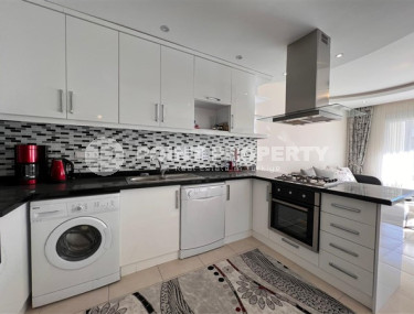 Linear three-room apartment, 120 m2 in a prestigious residential complex, 200 meters from the sea, Mahmutlar district.-id-2080-photo-2