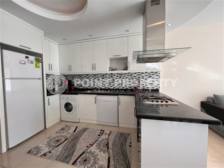 Linear three-room apartment, 120 m2 in a prestigious residential complex, 200 meters from the sea, Mahmutlar district.-id-2080-photo-4