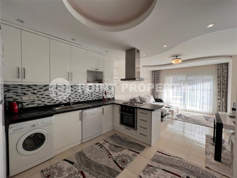 Linear three-room apartment, 120 m2 in a prestigious residential complex, 200 meters from the sea, Mahmutlar district.-id-2080-photo-8