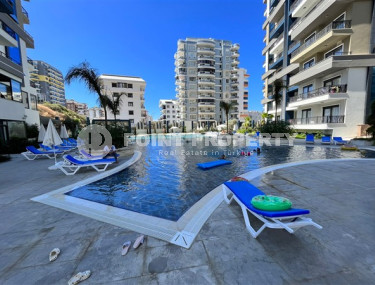 Apartment 1+1, 56m2 in the popular area of Mahmutlar. 750 meters to the sea.-id-2081-photo-2