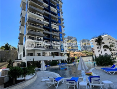 Apartment 1+1, 56m2 in the popular area of Mahmutlar. 750 meters to the sea.-id-2081-photo-3