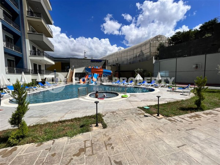 Апартаменты 1+1, 56м2 в популярном районе Махмутлар. До моря 750 метров.-id-2081-фото-4