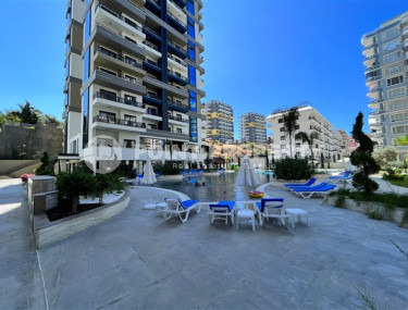 Apartment 1+1, 56m2 in the popular area of Mahmutlar. 750 meters to the sea.-id-2081-photo-5